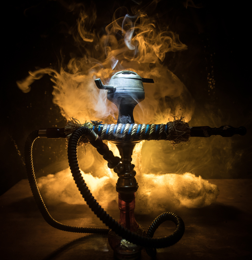 Hookah hot coals on shisha bowl with black background. Stylish oriental shisha. Shisha Concept